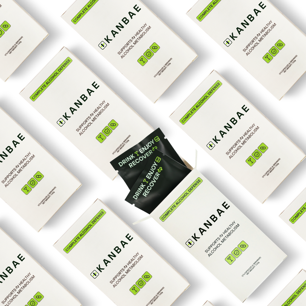 Image of multiple boxes of Kanbae Complete Alcohol Defense, with one box open showing sachets inside it.
